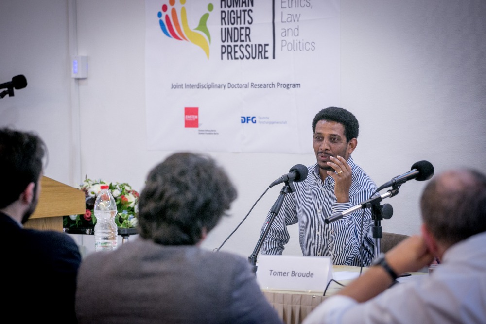 HR-UP PhD Candidate Habtom Mehari answering questions at a conference - June 2017